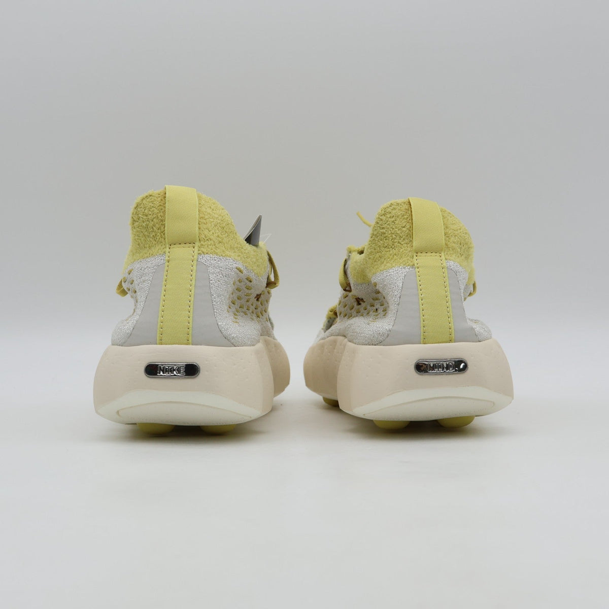 IR2176-003 Nike Mind 002 Flyknit "Light Bone/Saturn Gold" (Men's)