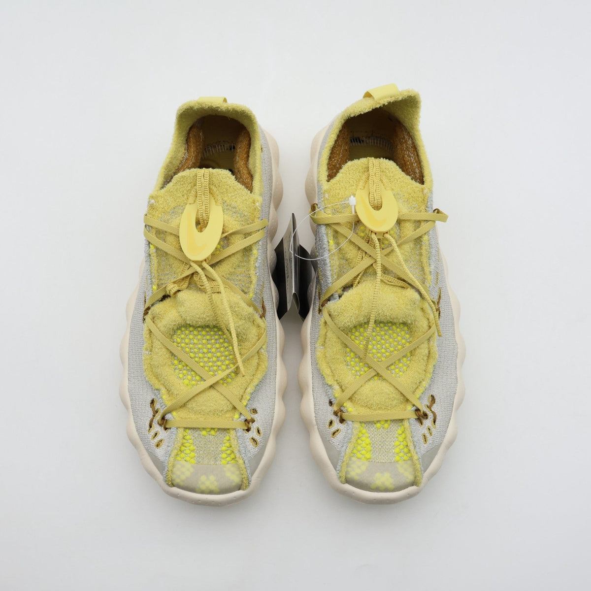 IR2176-003 Nike Mind 002 Flyknit "Light Bone/Saturn Gold" (Men's)