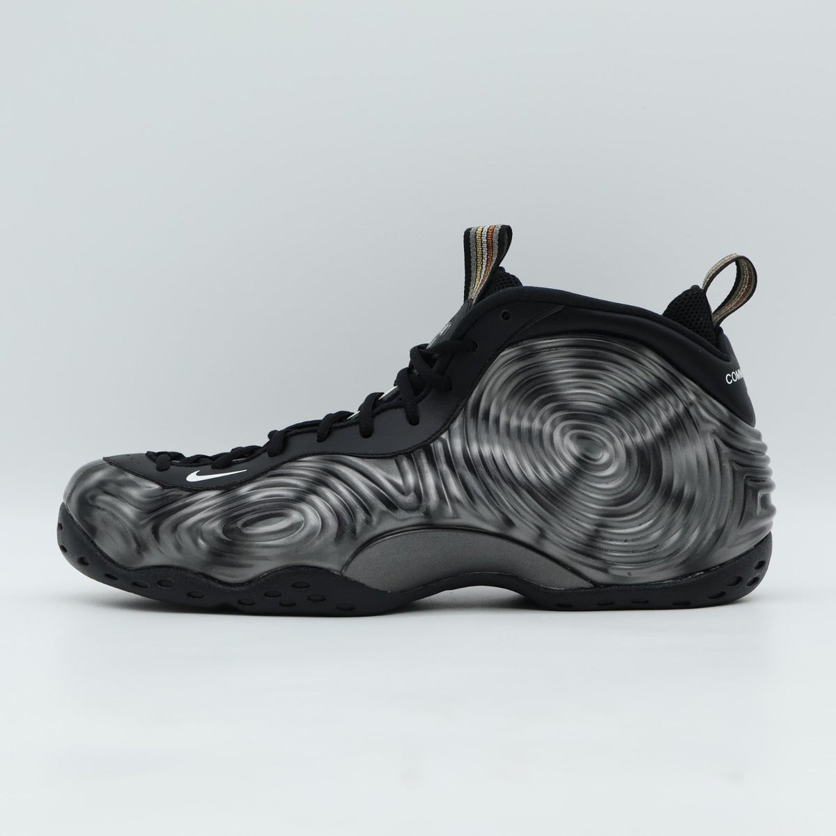 DJ7952-002 COMME des GARÃONS HOMME PLUS Nike Air Foamposite One Olympic (Men's)