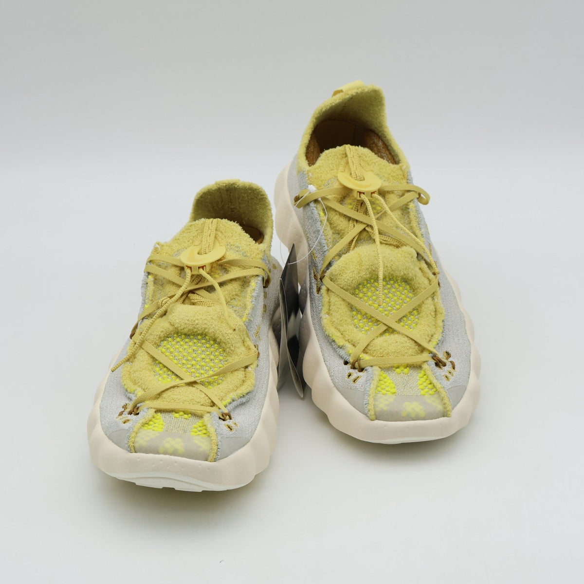 IR2176-003 Nike Mind 002 Flyknit "Light Bone/Saturn Gold" (Men's)