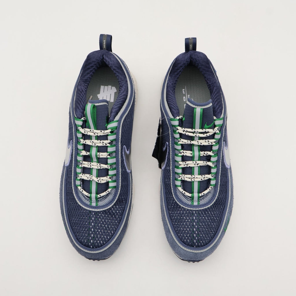 HV4847-400 UNDEFEATED Nike Air Zoom Spiridon Thunder Blue Silver (Men's)