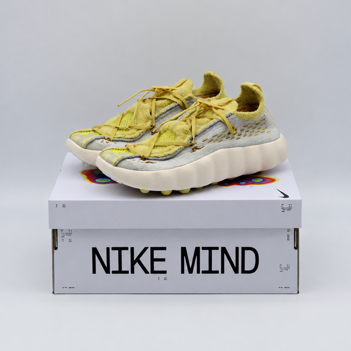 IR2176-003 Nike Mind 002 Flyknit "Light Bone/Saturn Gold" (Men's)